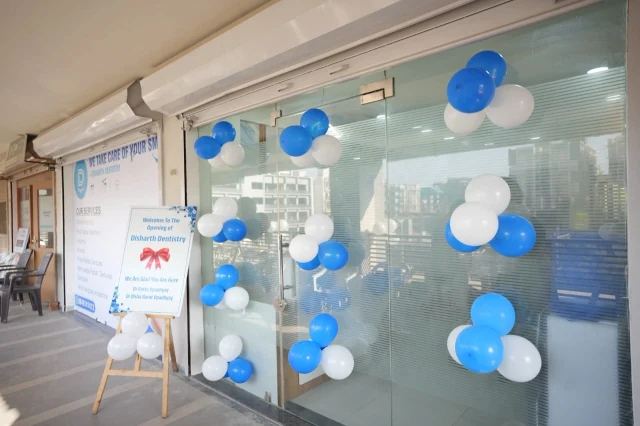 Glass entrance of Disharth Dentistry at Central Square, Chandkheda