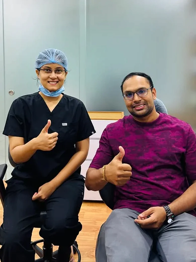 Dr. Disha Barot and a smiling patient at Disharth Dentistry